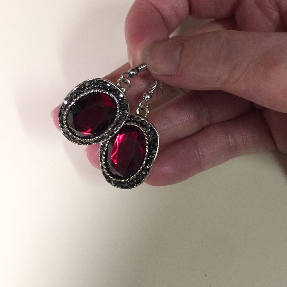 Brand new dangle statement earrings.